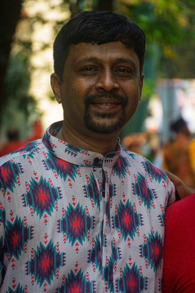 Portrait of a man in a patterned shirt