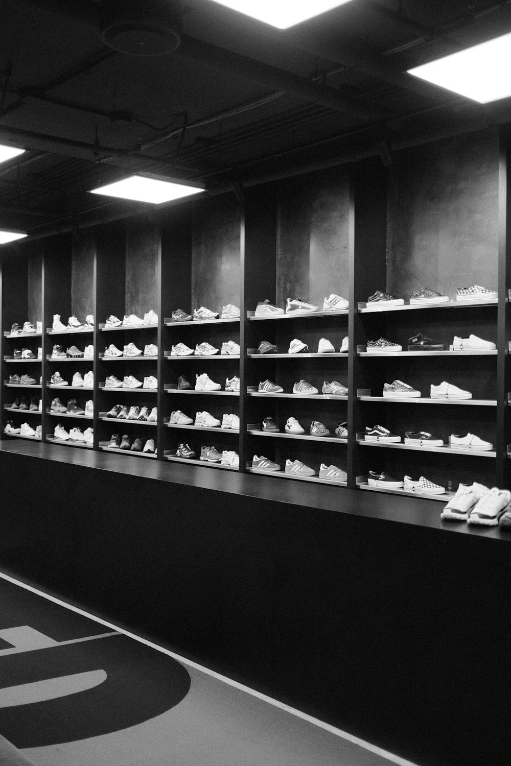 Black and white sneaker store wall