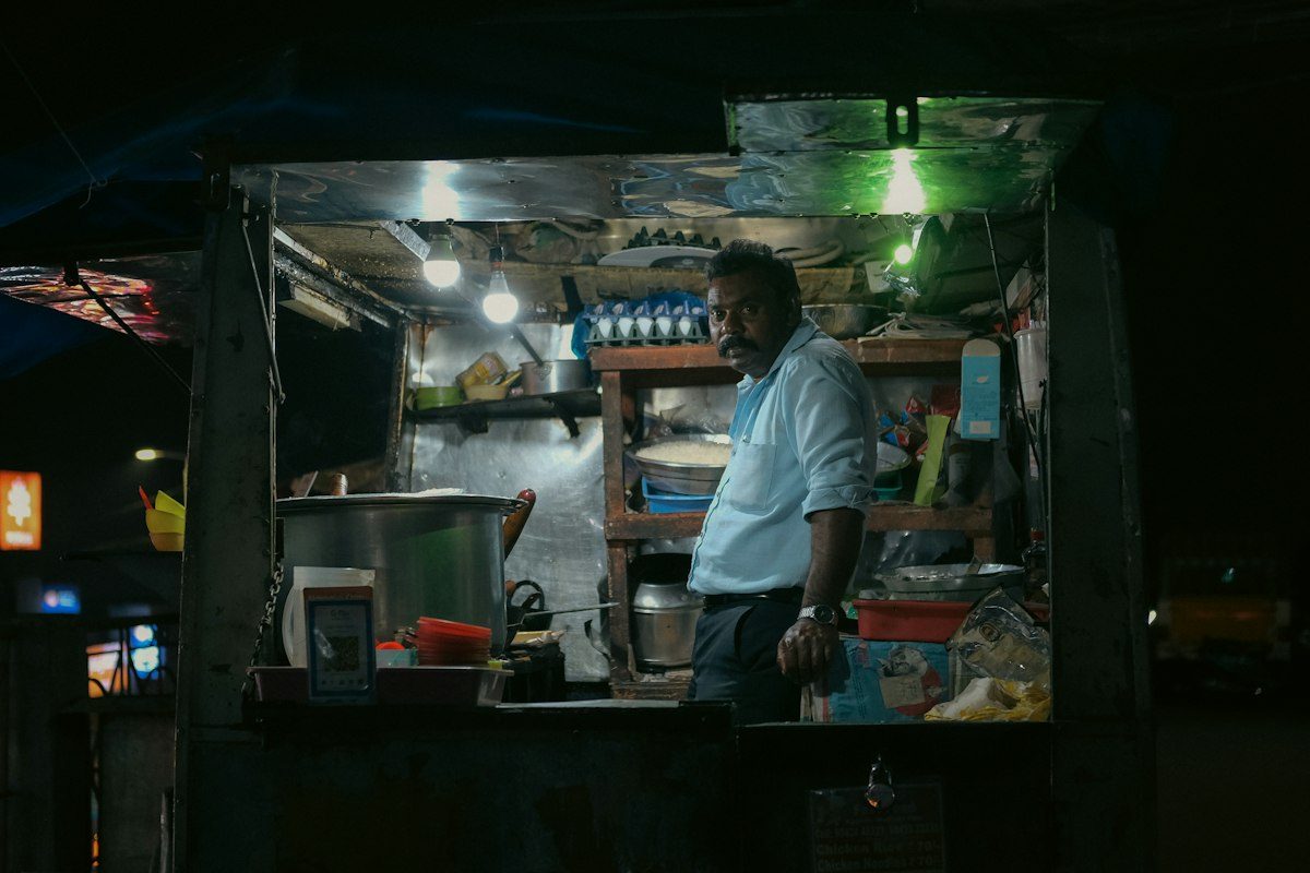 Snack stall lit up at night