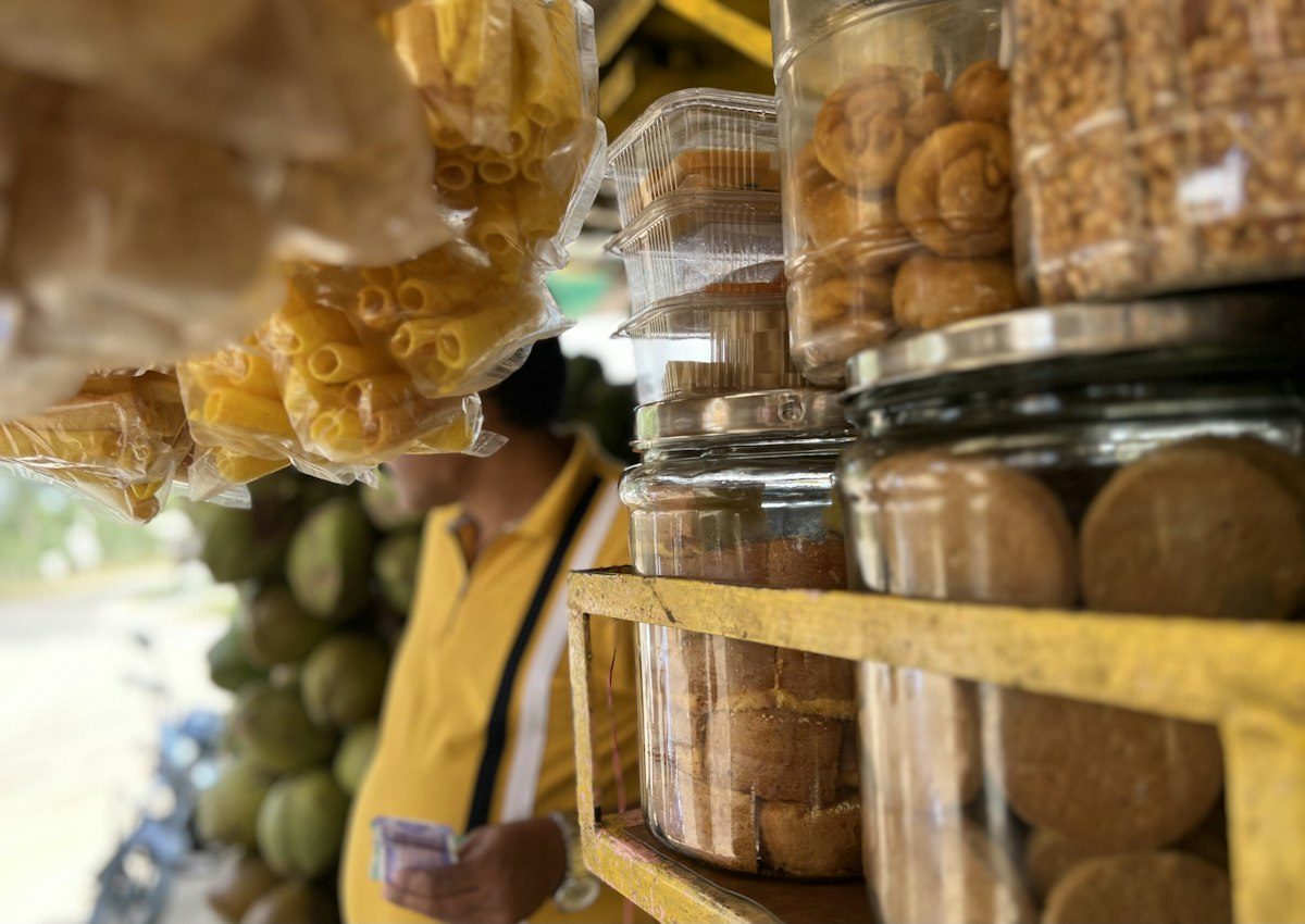 Shop shelves lined with jars of biscuits