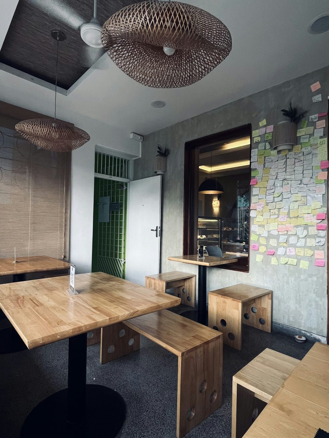 Small café interior with wooden tables